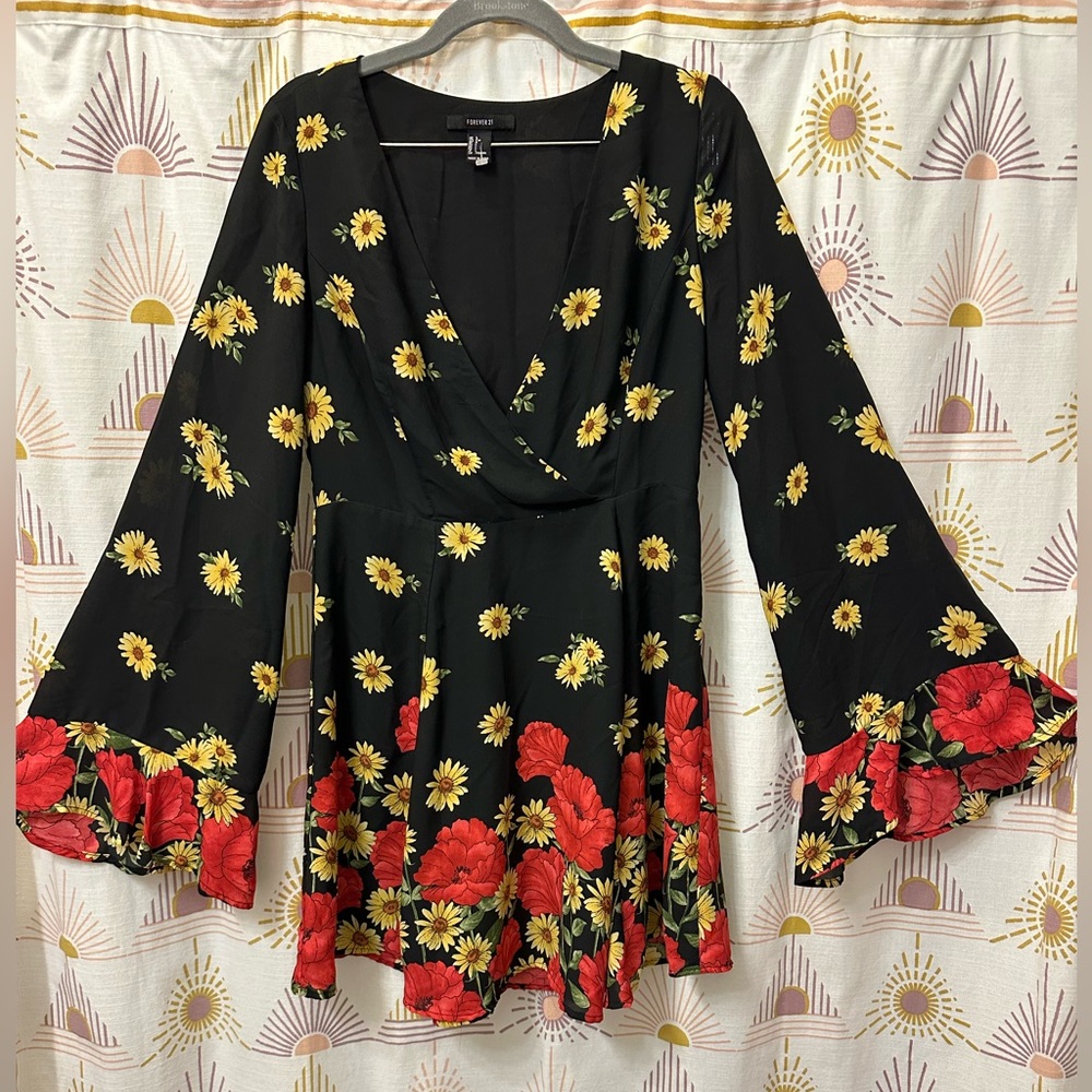 Black floral dress with bell sleeves